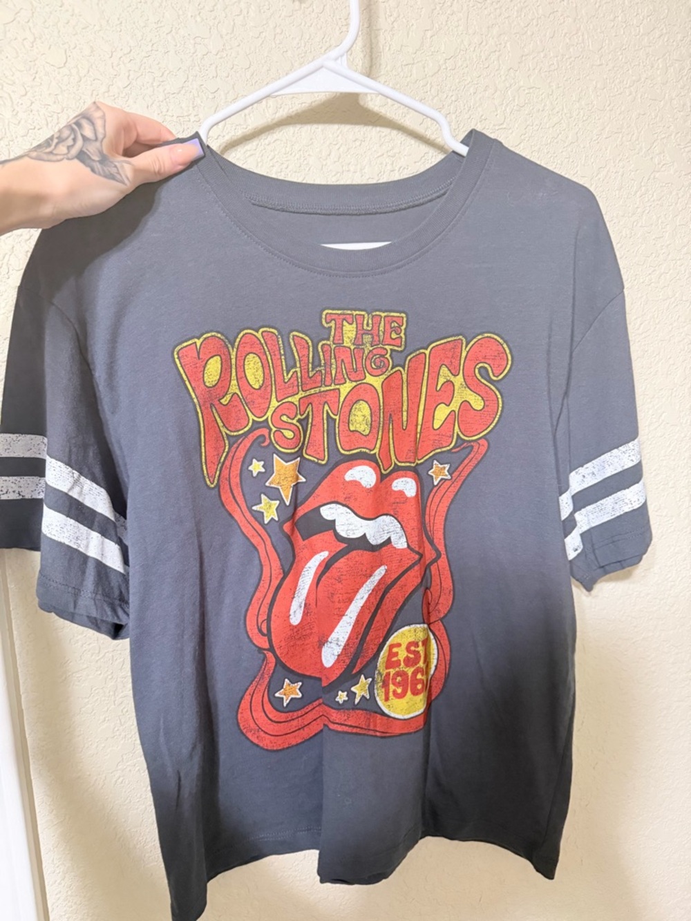 the Rolling Stones Black Tee with Red & Yellow Tongue Graphic